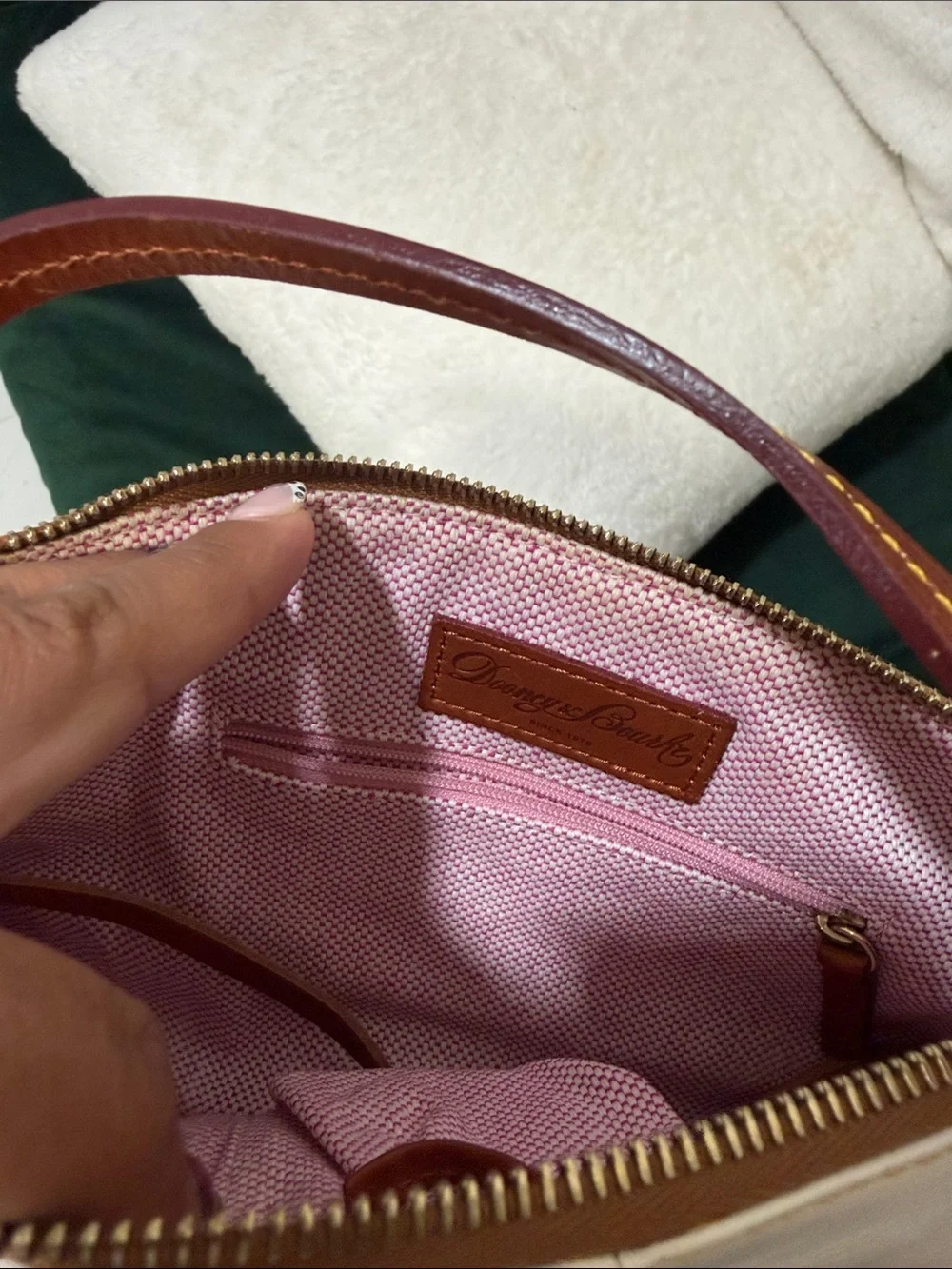Dooney & Bourke Cream Leather Wristlet with Brown Trim - Sleek Everyday Clutch